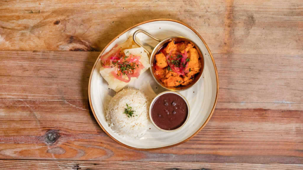 Chicken with rice beans and yuca